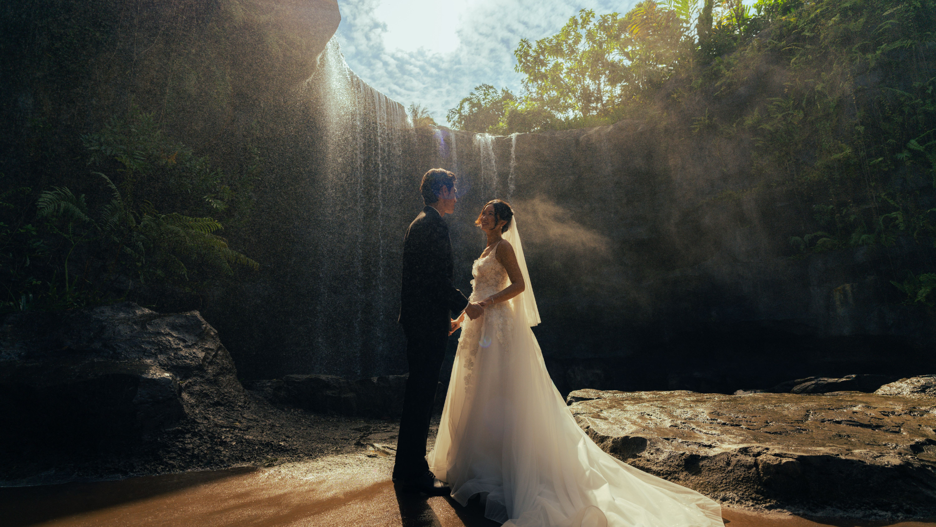 Wedding photo shoot in front of the Waterfall, Bird Paradise. 